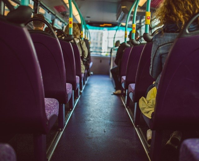 View down the aisle of a bus