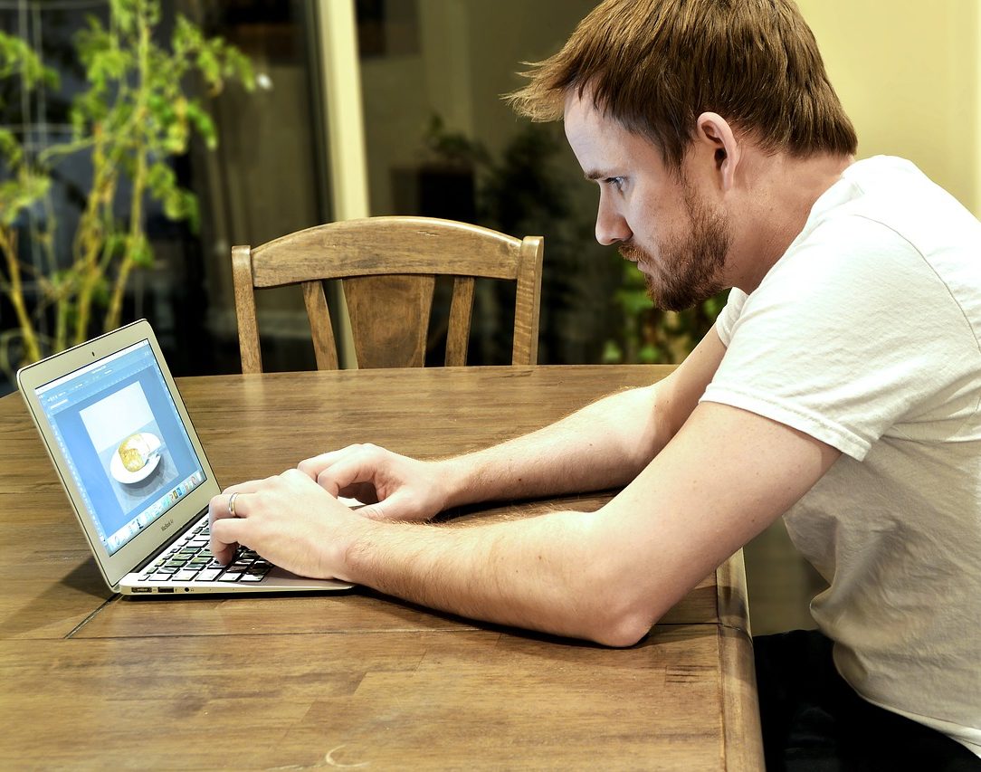Man using laptop computer