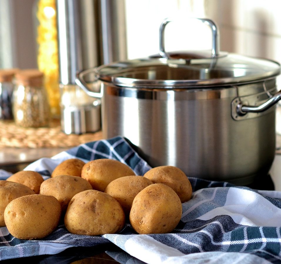 Kitchen; large steel pot and potatoes