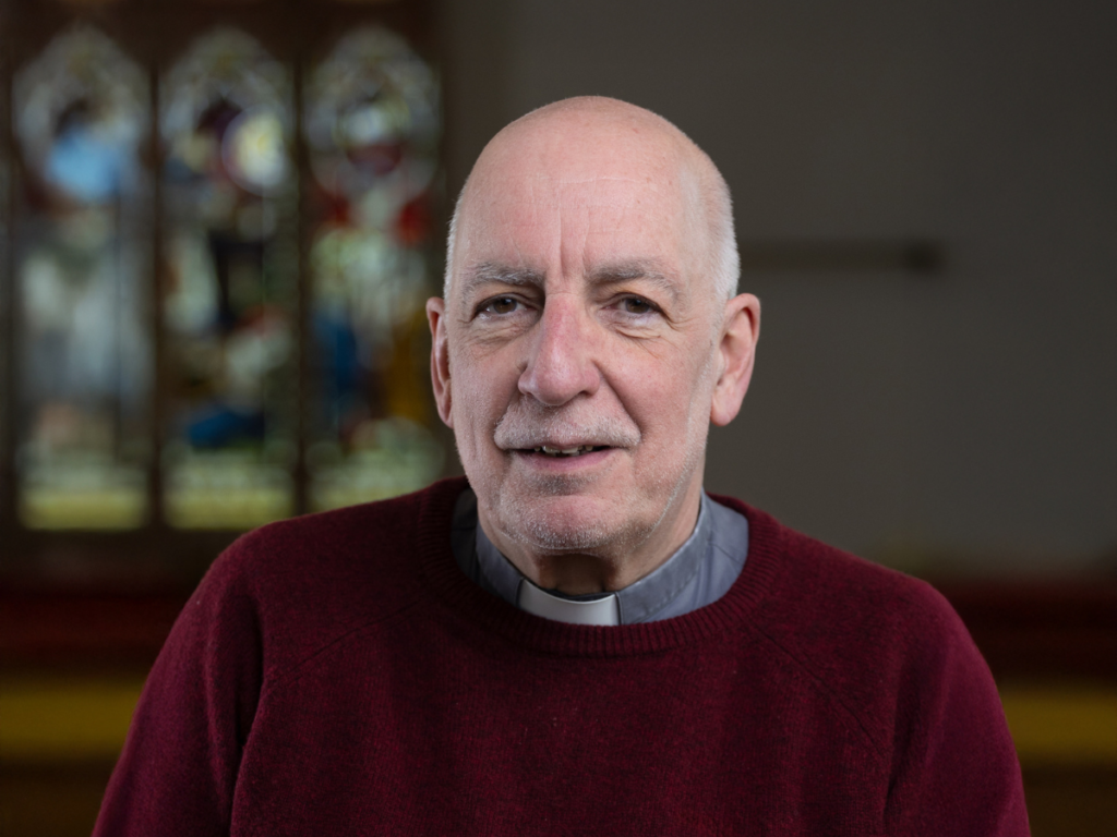 A portrait of Canon Reverend Simon Baker