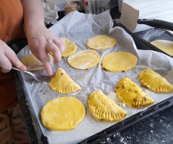 A resident making Jamaican patties at Ark House, Stroud